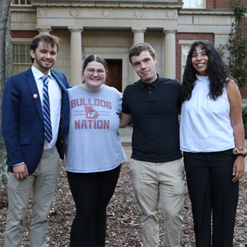 Picture of First-Gen Law Student Association Leadership in front of the School of Law building